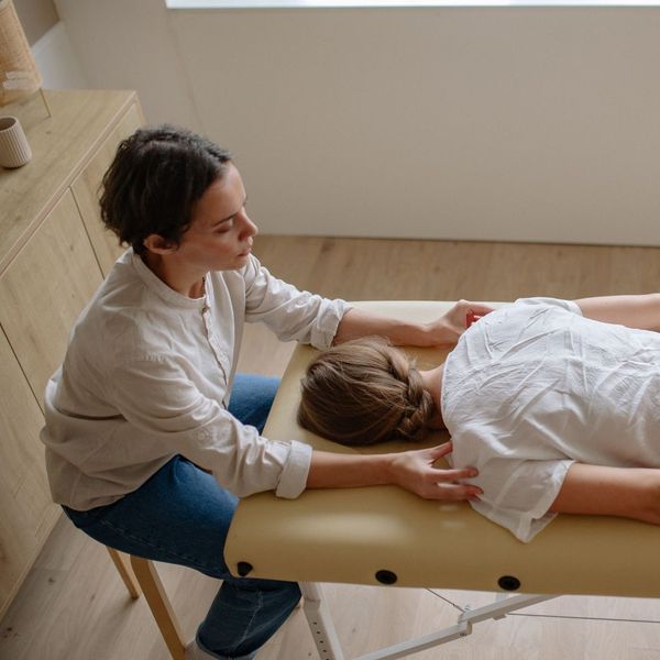 chiropractor working on patient
